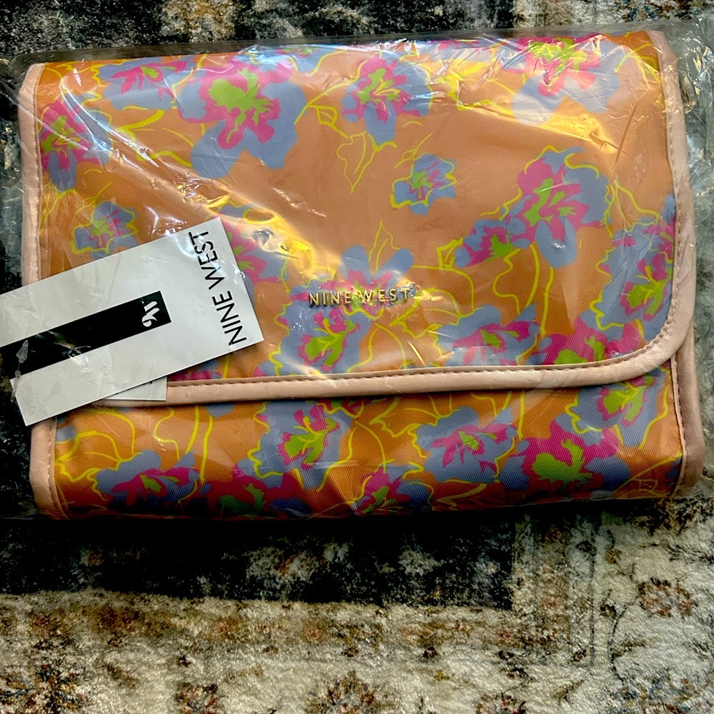 New Nine West travel bag.
